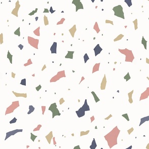 Large scale Terrazzo pattern in muted green​,​ ochre and pink tones on a white background
