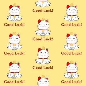 Good luck Maneki Neko cats on golden yellow