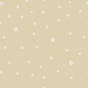 Small white flowers on dark cream background