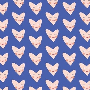 Smiley heart faces on blue background 