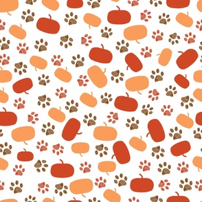 Paw prints and pumpkins. Happy Halloween background greeting card fabric design seamless pattern