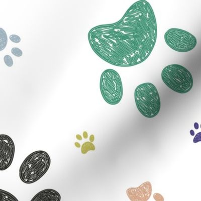 Doodle colorful paw prints seamless fabric design pattern