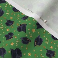 Small Scale Graduation Caps Stars and Streamers on Green