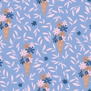flowers in ice cream cone on light blue-LARGE