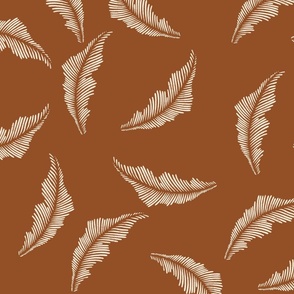 Western large tossed feather in brown for wallpaper