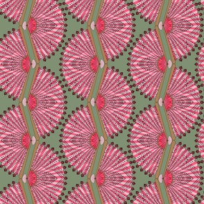 Fancy pink paper fans on sage green