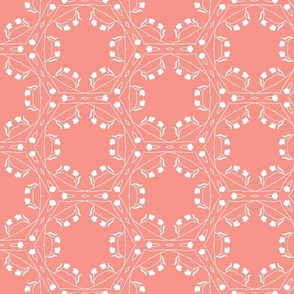 White geometric floral on coral