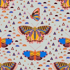 Geo Butterfly Triangles Semicircle Multi Color Rainbow Design on Sky Blue 