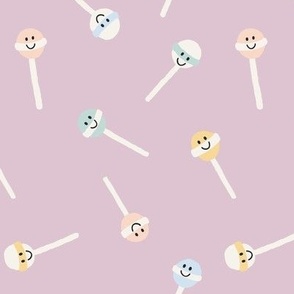 Happy face Lollipops on Pastel Lilac