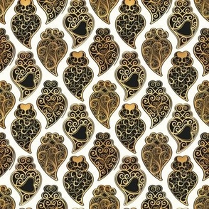 Tiny scale // Gold Coração de Viana // natural white background ornamental black and golden Portuguese Viana hearts extravagant gold cord filigree passementerie style inspiration