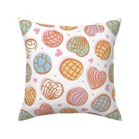 Normal scale // Mexican pan dulce // white background multicolored conchas