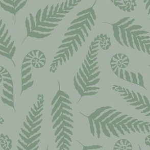 Green fern on green-gray