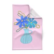 blue line art flowers in blue vase on light pink tea towel 