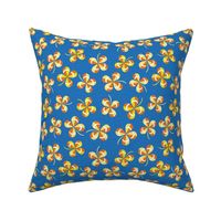tossed lucky clover on cobalt blue | small