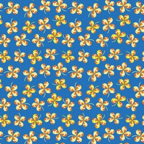 tossed lucky clover on cobalt blue | small