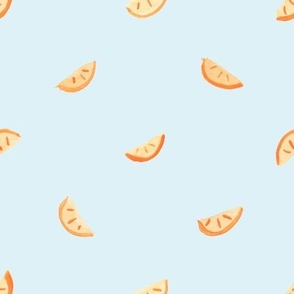 orange slices light blue background