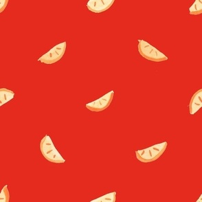 orange slices red background