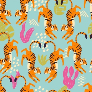 Cute tigers on bright blue background 