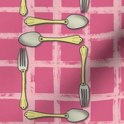  Yellow gold fork and spoon on lined pale cherry red pink  background