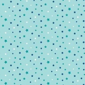 Retro royal blue, teal and white ditsy stars on light baby blue quilt fabric