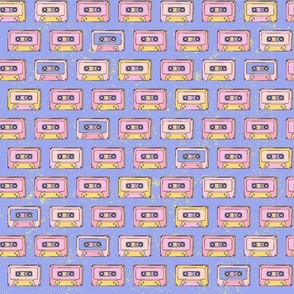 Retro - audio cassettes. Purple background.