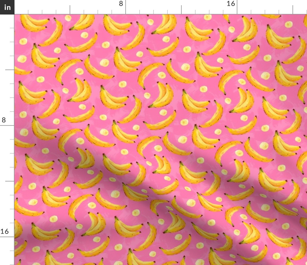 Juicy modern bananas on a bright pink background