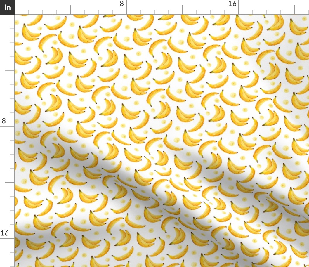 Bright yellow bananas on white
