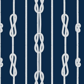 White rope and sailor's knots pattern on a deep blue background