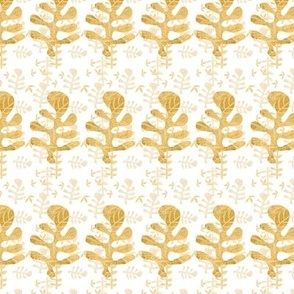Cut out monoprinted patterned tossed leaves and striped leaves in yellow earthy colours 6” repeat 