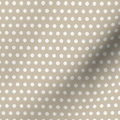 White baseball dots on a beige tan background - small scale
