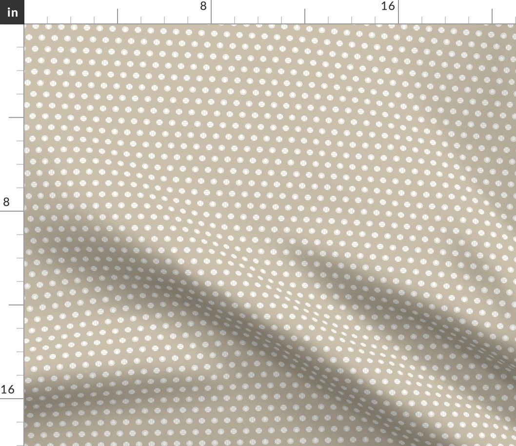 White baseball dots on a beige tan background - small scale