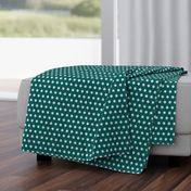 White baseball dots on a teal aqua background - large scale