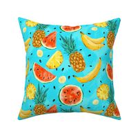 Summer vivid fruits on blue, banana, watermelon, pineapples