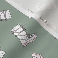 Retro snowboots illustration - winter clothing warm cozy fashion icon white pink on soft sage green 