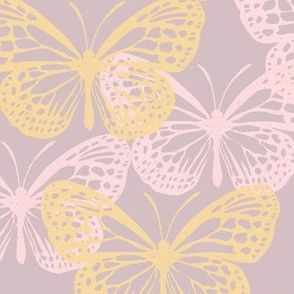 Beautiful butterflies in pink and yellow on taupe