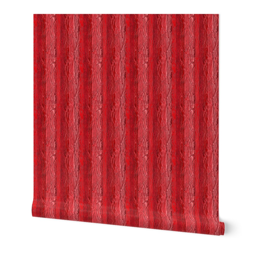 Highly textured bright colourful vertical stripes 12” repeat in Monochrome red hues with salmon 