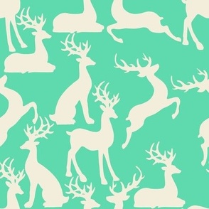 Aqua green jumping and sitting reindeer for preppy christmas table fabric and wallpaper