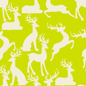 Lime green jumping and sitting reindeer for preppy christmas table fabric and wallpaper