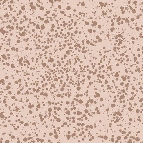 Coffee splashes on cocoa background