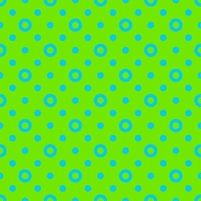 Blue rings and dots on a bright green background
