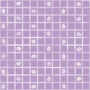 Cocoa beans on distressed orchid and white grid