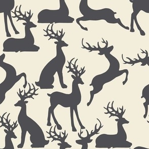 Dark grey jumping and sitting reindeer for preppy christmas table and wallpaper