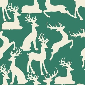 Forest green jumping and sitting reindeer for preppy christmas table and wallpaper