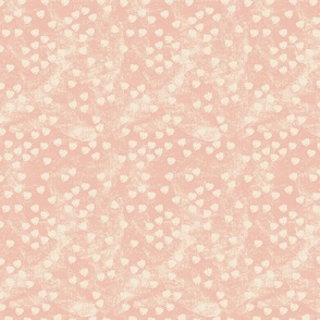 Tiny small cream flowers on watercolor textured blush background