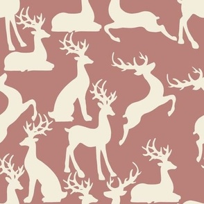 Dusty rose pink jumping and sitting reindeer for preppy christmas table fabric and wallpaper