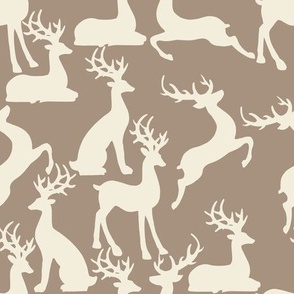 Beige jumping and sitting reindeer for neutral preppy christmas table fabric and wallpaper