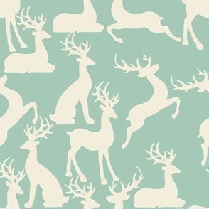 Aqua jumping and sitting reindeer for preppy christmas table fabric and wallpaper