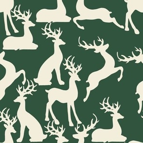 Dark green jumping and sitting reindeer for preppy christmas table fabric and wallpaper