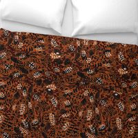 Animal print leopard/ feathers burnt sienna