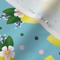 Spring Lemons and Blossom on Light Blue Background